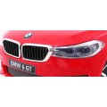 Bateriově napájené auto BMW 6 GT červené + dálkové ovládání + pomalý start + EVA + bezpečnostní pásy + MP3 LED