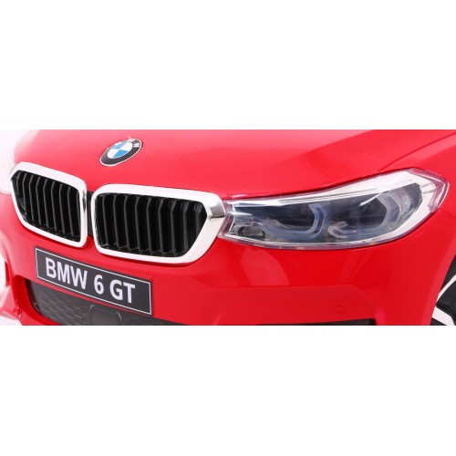 Bateriově napájené auto BMW 6 GT červené + dálkové ovládání + pomalý start + EVA + bezpečnostní pásy + MP3 LED