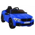 Modré DRIFTOVACÍ vozidlo BMW M5