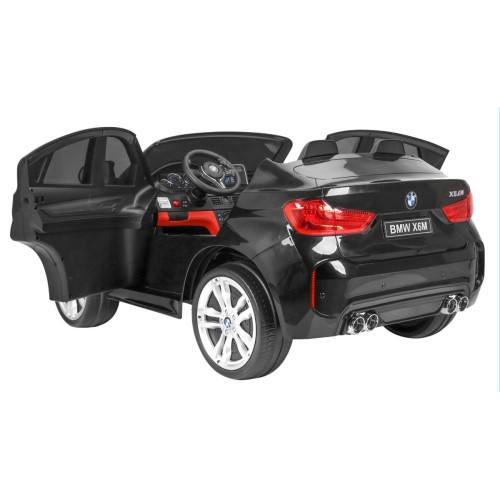 BMW X6M XXL pro 2 děti barva černá dálkové ovládání pásy pomalý start MP3 LED