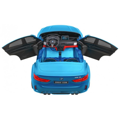 BMW X6M XXL pro 2 děti barva modrá dálkové ovládání pásy pomalý start MP3 LED