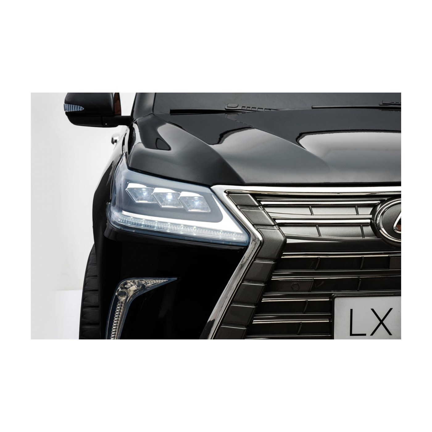 Lexus LX570 lakované 2 dětské auto černé + dálkové ovládání EVA kola rádio MP3 LED