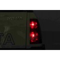 Bílá dětská baterie Toyota Hilux + 4x4 + dálkové ovládání + 2 nosiče zavazadel + MP3 rádio + LED