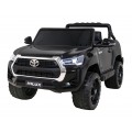 Dětská baterie Toyota Hilux černá + 4x4 + dálkové ovládání + 2 nosiče zavazadel + MP3 rádio + LED