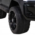 Dětská baterie Toyota Hilux černá + 4x4 + dálkové ovládání + 2 nosiče zavazadel + MP3 rádio + LED