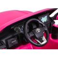Dětská baterie Toyota Hilux napájená růžovou barvou + pohon 4x4 + dálkové ovládání + 2 nosiče zavazadel + MP3 rádio + LED