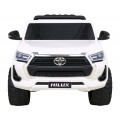 Bílá dětská baterie Toyota Hilux + 4x4 + dálkové ovládání + 2 nosiče zavazadel + MP3 rádio + LED