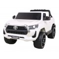 Bílá dětská baterie Toyota Hilux + 4x4 + dálkové ovládání + 2 nosiče zavazadel + MP3 rádio + LED
