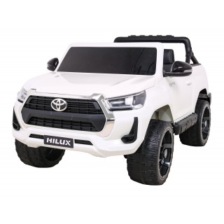 Bílá dětská baterie Toyota Hilux + 4x4 + dálkové ovládání + 2 nosiče zavazadel + MP3 rádio + LED