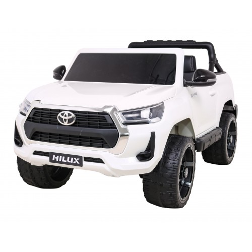 Bílá dětská baterie Toyota Hilux + 4x4 + dálkové ovládání + 2 nosiče zavazadel + MP3 rádio + LED