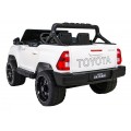 Bílá dětská baterie Toyota Hilux + 4x4 + dálkové ovládání + 2 nosiče zavazadel + MP3 rádio + LED