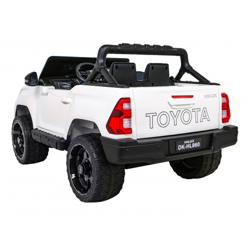 Bílá dětská baterie Toyota Hilux + 4x4 + dálkové ovládání + 2 nosiče zavazadel + MP3 rádio + LED