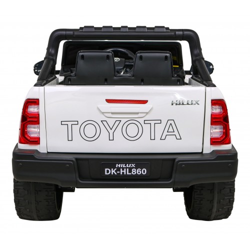 Bílá dětská baterie Toyota Hilux + 4x4 + dálkové ovládání + 2 nosiče zavazadel + MP3 rádio + LED