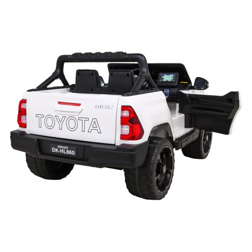 Bílá dětská baterie Toyota Hilux + 4x4 + dálkové ovládání + 2 nosiče zavazadel + MP3 rádio + LED