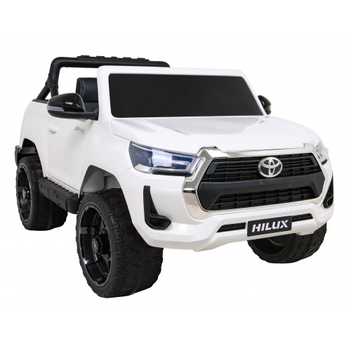 Bílá dětská baterie Toyota Hilux + 4x4 + dálkové ovládání + 2 nosiče zavazadel + MP3 rádio + LED