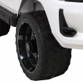 Bílá dětská baterie Toyota Hilux + 4x4 + dálkové ovládání + 2 nosiče zavazadel + MP3 rádio + LED