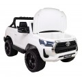 Bílá dětská baterie Toyota Hilux + 4x4 + dálkové ovládání + 2 nosiče zavazadel + MP3 rádio + LED