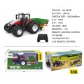 Červený R/C traktor se secím strojem