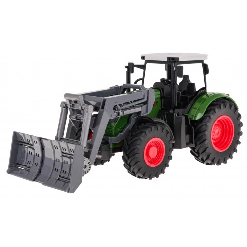 Zelený traktor s buldozerem