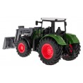 Zelený traktor s buldozerem