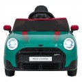 Zelené vozidlo Mini Cooper