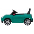 Zelené vozidlo Mini Cooper