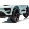 Modré vozidlo Porsche Macan