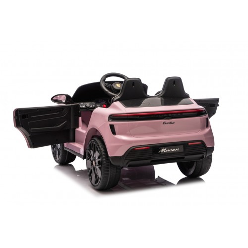 Růžové vozidlo Porsche Macan