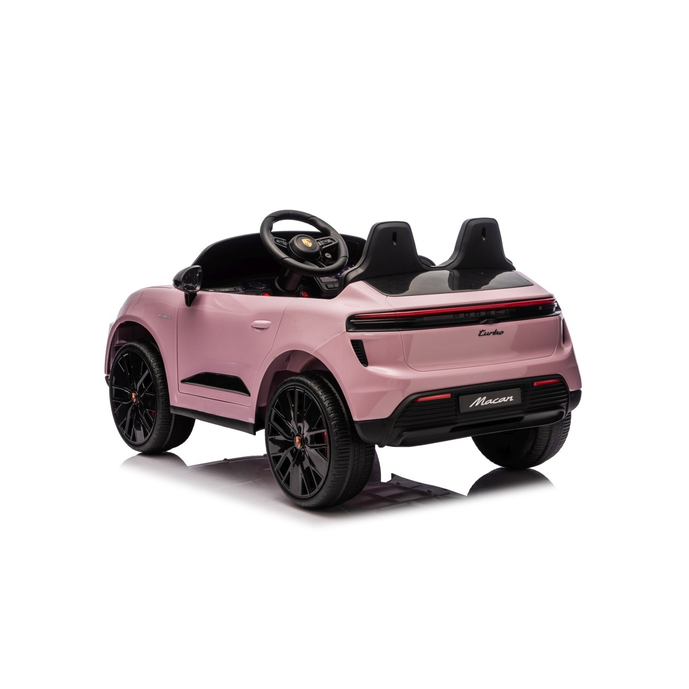 Růžové vozidlo Porsche Macan