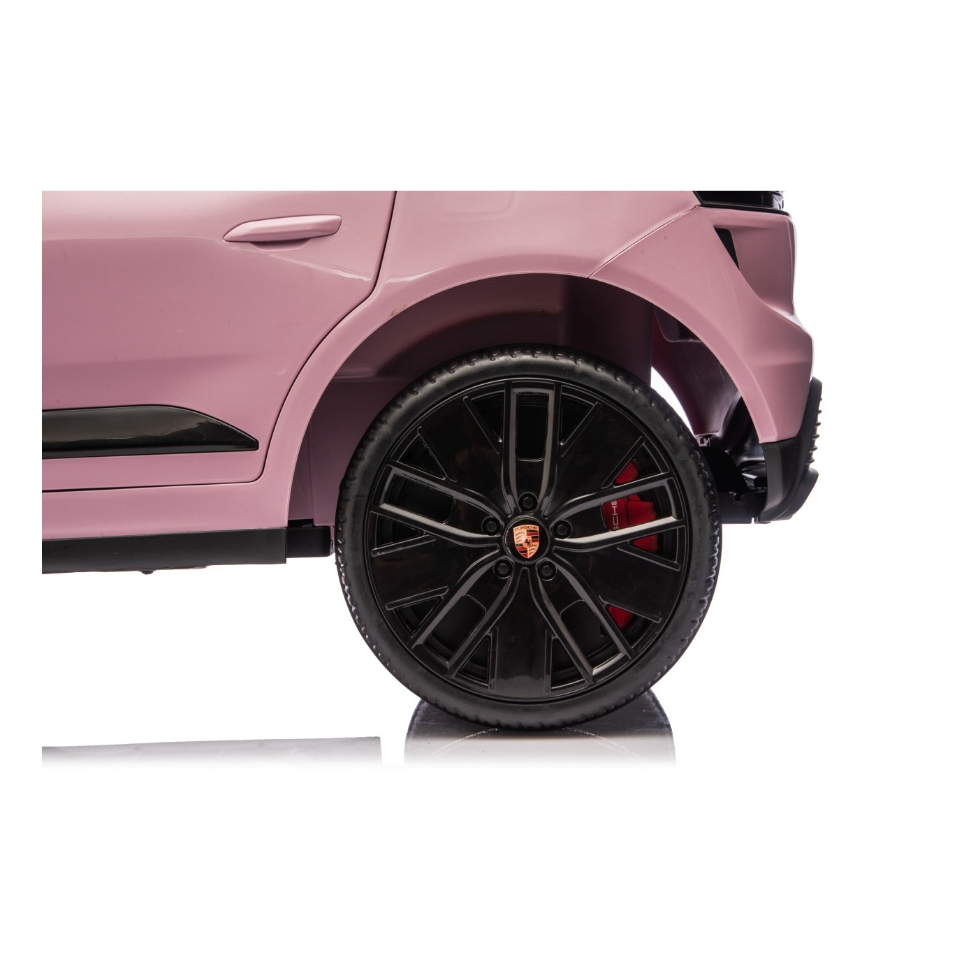 Růžové vozidlo Porsche Macan