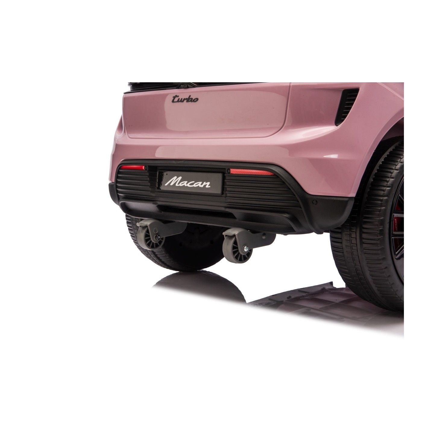 Růžové vozidlo Porsche Macan
