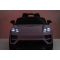 Růžové vozidlo Porsche Macan