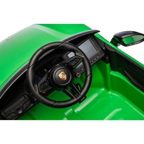 Zelené vozidlo Porsche Macan