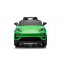 Zelené vozidlo Porsche Macan
