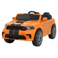 Oranžové vozidlo Dodge Durango