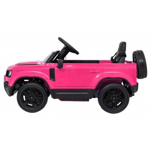 Růžové vozidlo Land Rover Defender