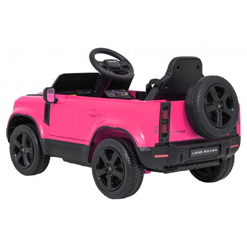 Růžové vozidlo Land Rover Defender