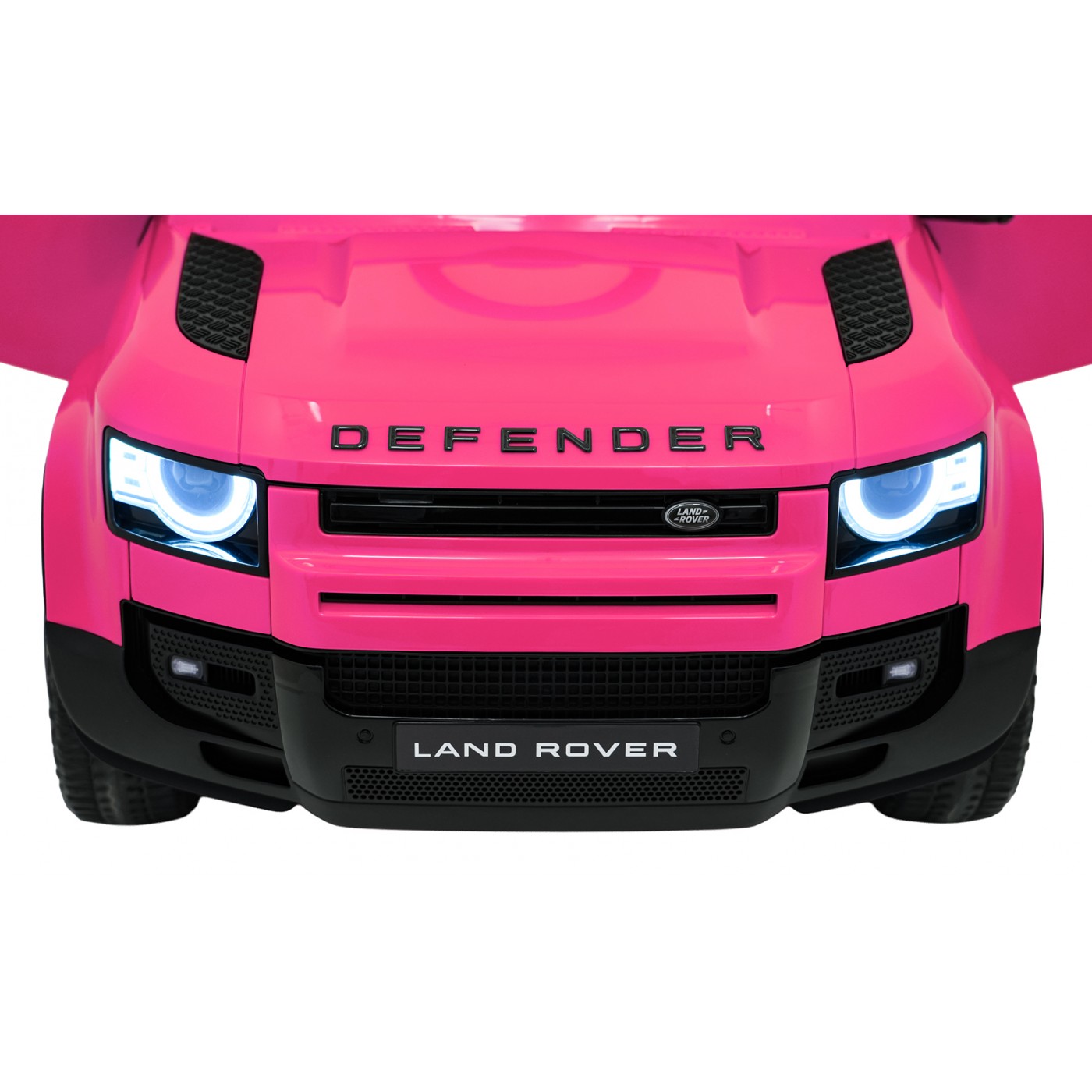 Růžové vozidlo Land Rover Defender