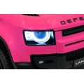 Růžové vozidlo Land Rover Defender