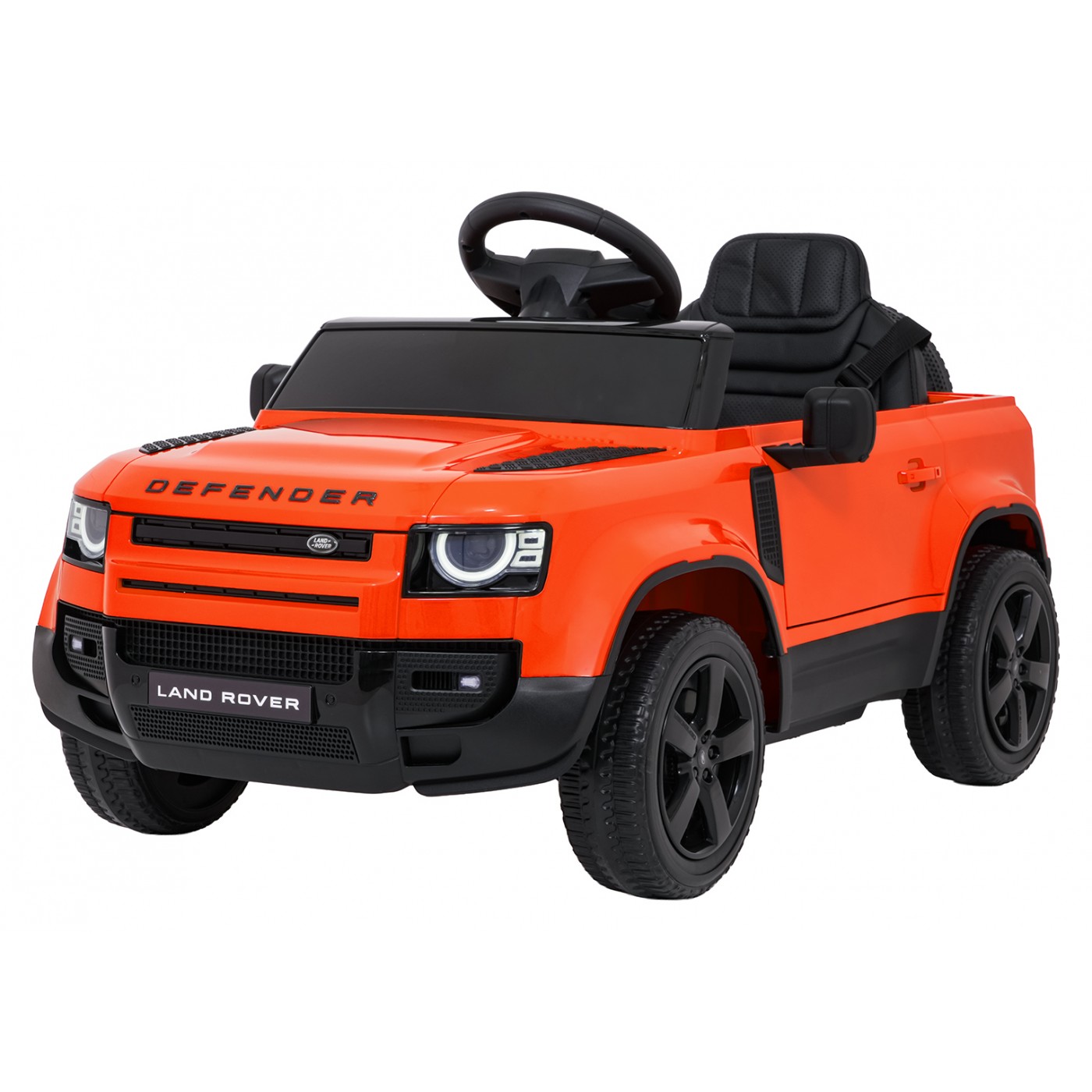 Oranžové vozidlo Land Rover Defender