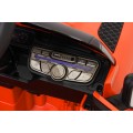 Oranžové vozidlo Land Rover Defender