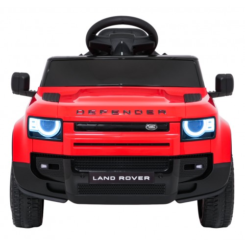 Červené vozidlo Land Rover Defender