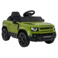 Zelené vozidlo Land Rover Defender