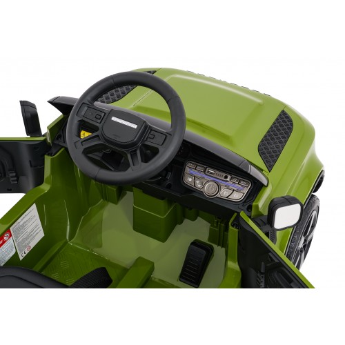 Zelené vozidlo Land Rover Defender