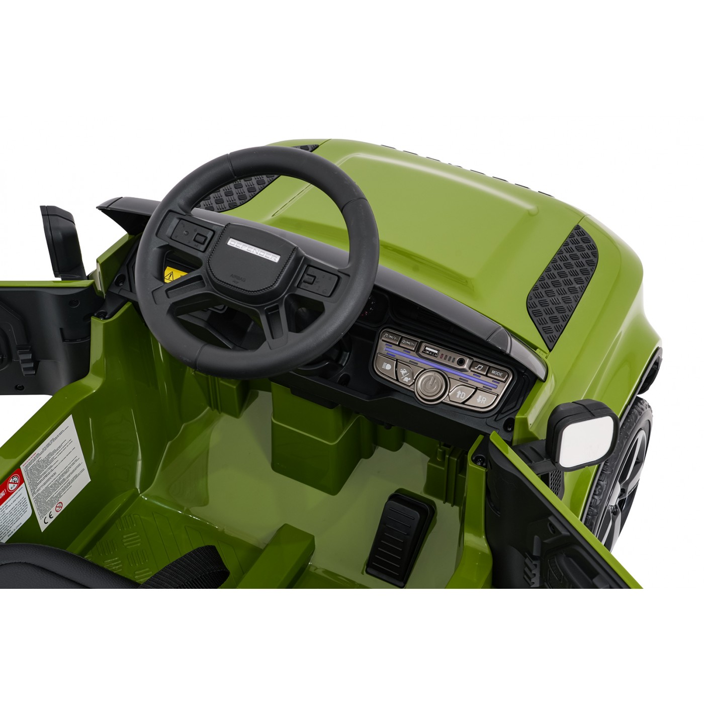 Zelené vozidlo Land Rover Defender