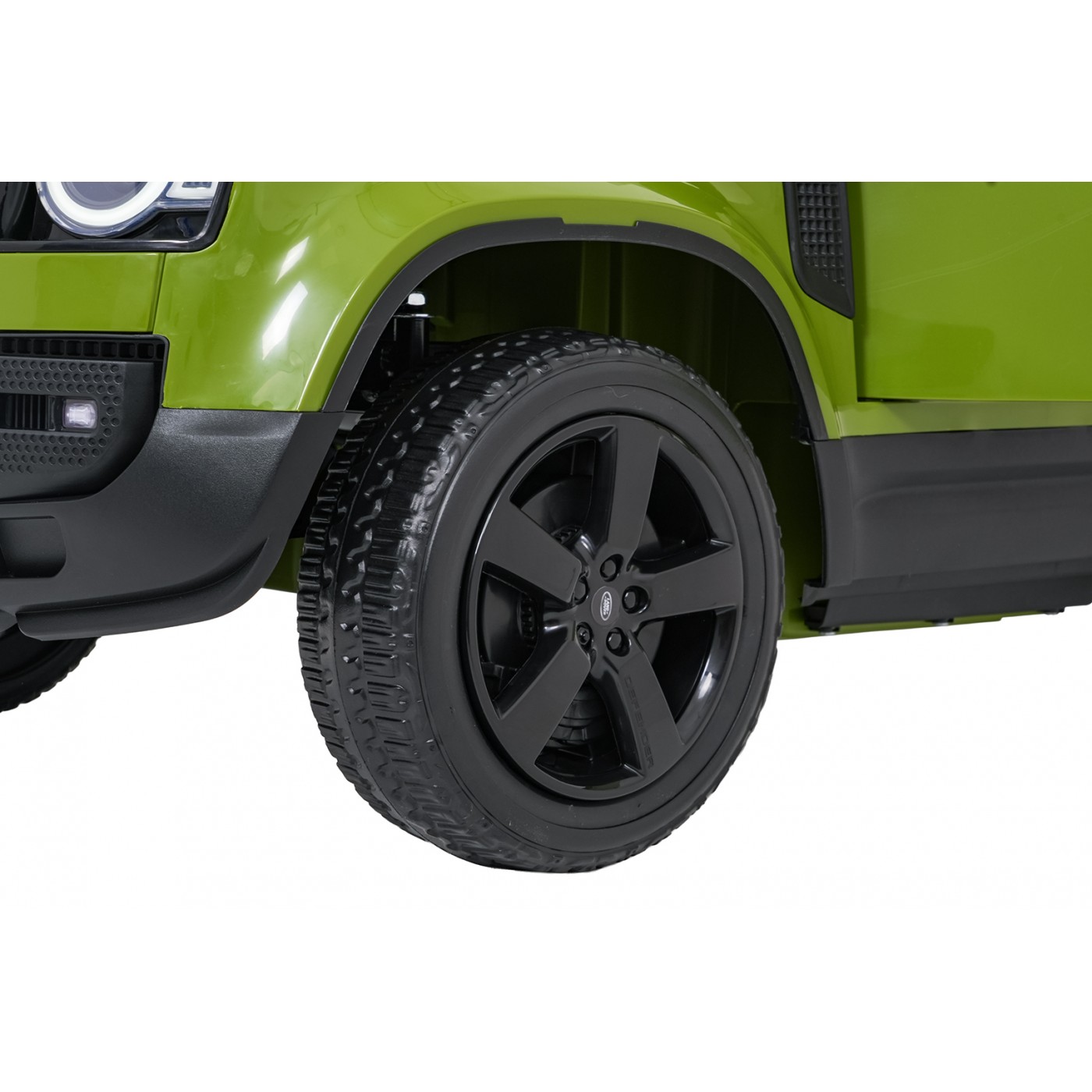 Zelené vozidlo Land Rover Defender