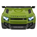 Zelené vozidlo Land Rover Defender