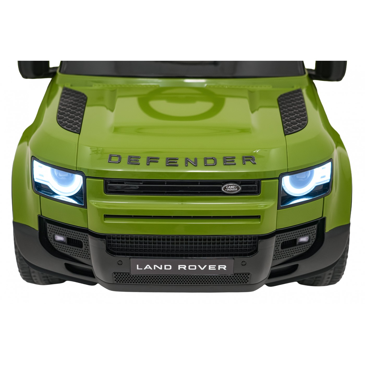 Zelené vozidlo Land Rover Defender