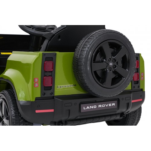 Zelené vozidlo Land Rover Defender